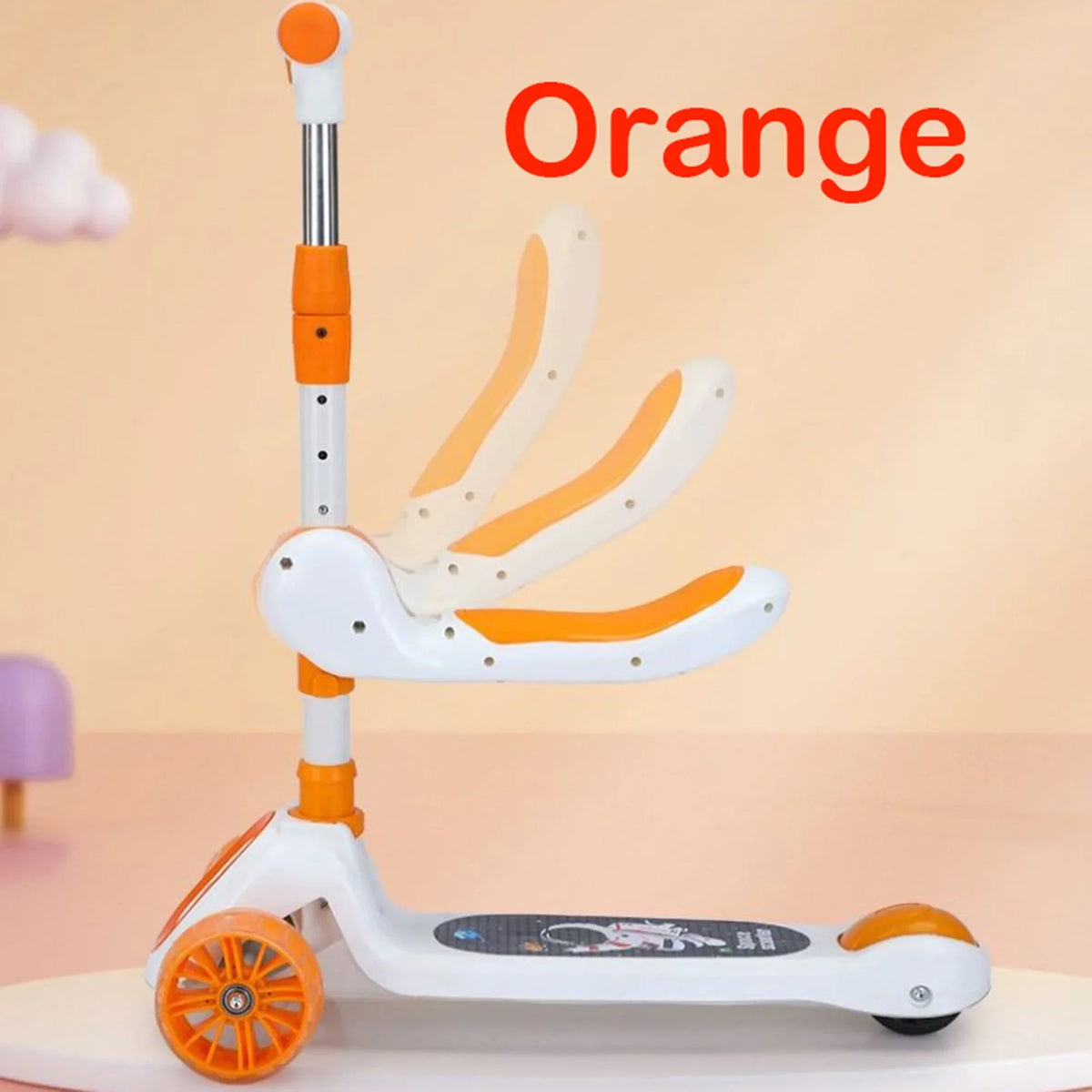 Children's scooter with orange accents on a beige background